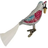 Exklusiver Vogel mit Glasfaserschweif und freigeformten Schnäbelchen mit kleinem Körbchen im Schnabel